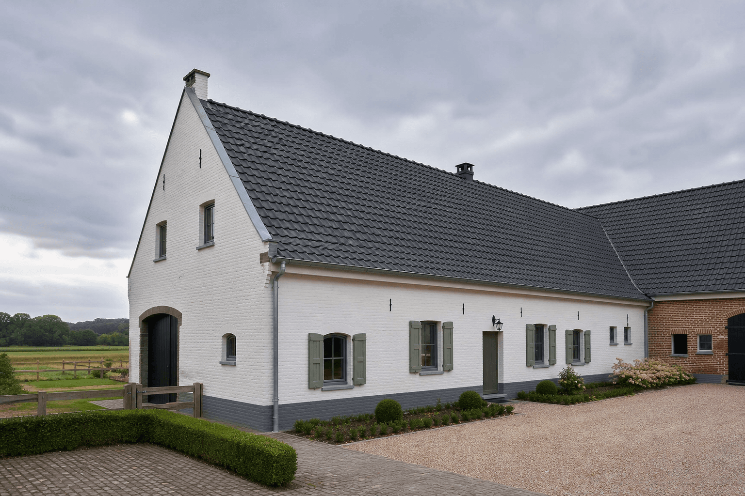 Volledige dakrenovatie met pannen en zinken goten op een landelijke woning in Aarschot